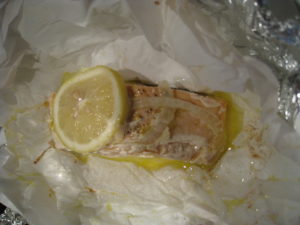 Unwrap baked salmon